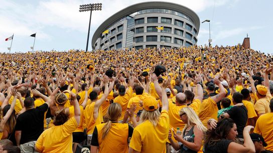 The Hawkeye Wave: Why Iowa City’s Beloved Tradition Is a Powerful Draw for Newcomers (Study in Iowa)